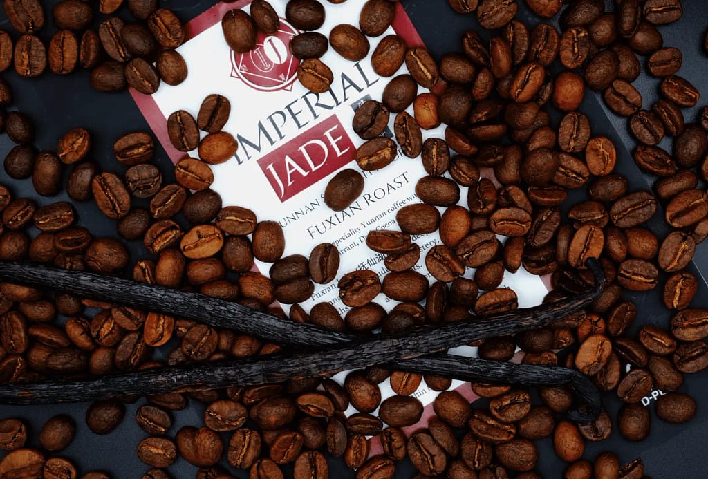 Dark roasted specialty coffee. Specialty coffee beans. Vanilla coffee.