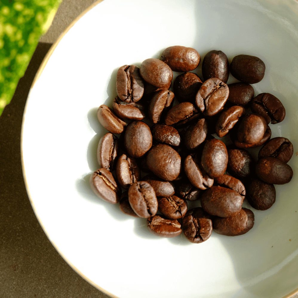 Dark roasted coffee beans. Dark roast coffee, luxury coffe, yunnan specialty coffee